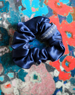 Load image into Gallery viewer, Grip Tidal silk hair tie, close-up showing bias-cut Grade 6A silk