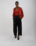 Load image into Gallery viewer, Red silk top and black silk palazzo trousers by Paradisefold
