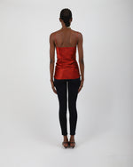 Load image into Gallery viewer, Person wearing a red silk top and black pants on a white background, by Paradisefold